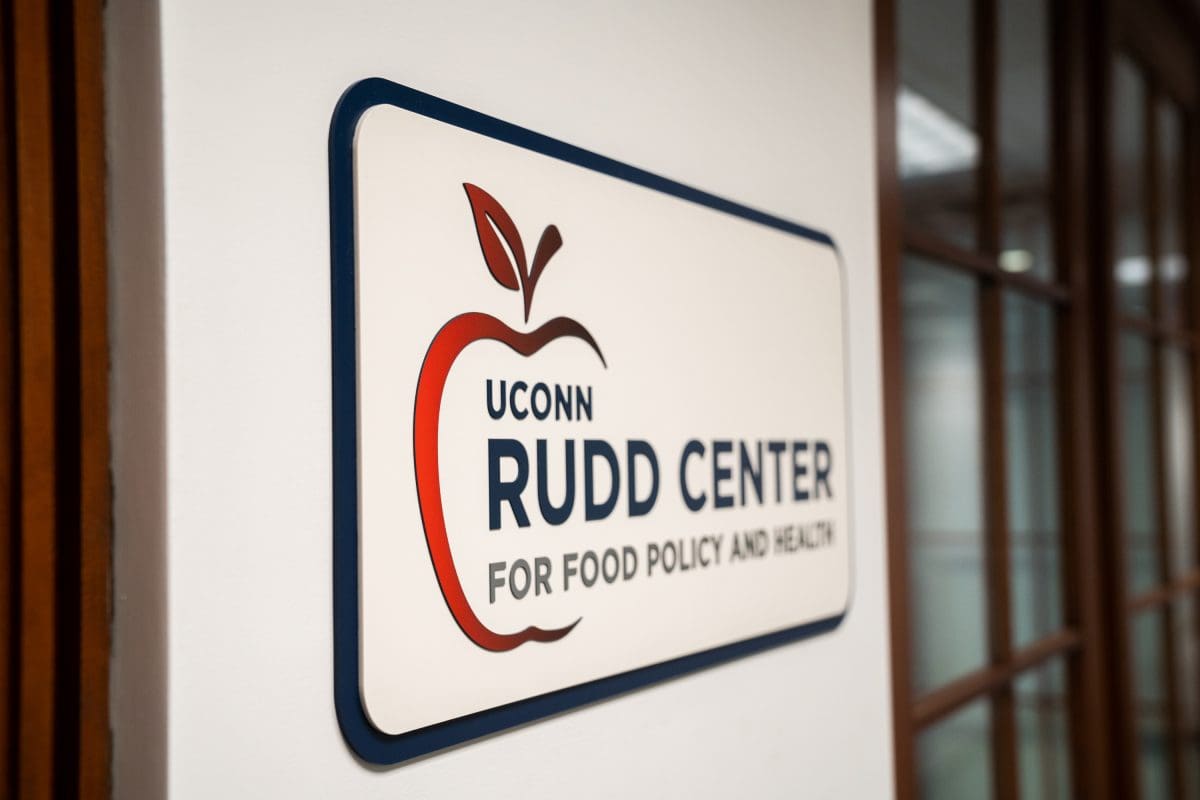 A sign with an apple icon and the words "UConn Rudd Center for Food Policy and Health"