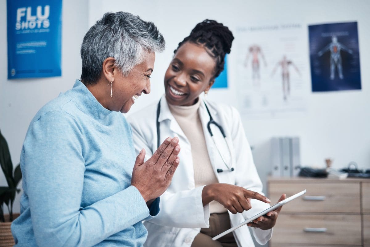 Doctor discusses promising test results with a patient