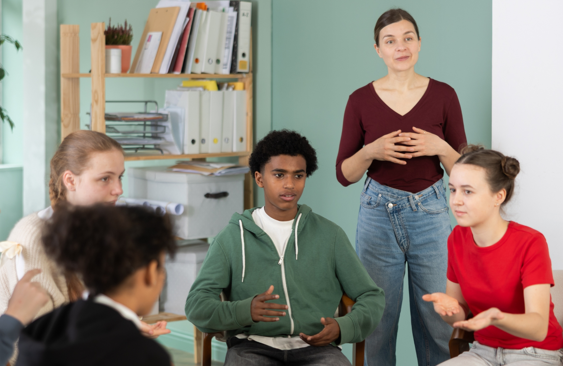 Smiling high school students participating in a focus group